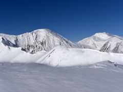 08F Pik Krasina and Pik Tsyurupy from Yuhin Peak summit 5100m above Ak-Sai Travel Lenin Peak Camp 1 4400m